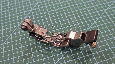 PRENSATELAS TENSOR DE ELASTICO OVERLOCK 1/4 S