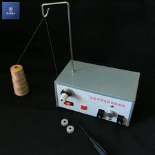 CARGADOR DE BOBINA BORDADORA TYPICAL/TAJIMA