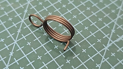 RESORTE REECE DEL ALIMENTADOR DE HILO