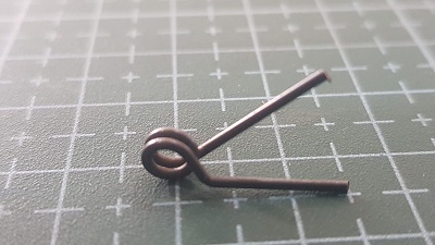 RESORTE PRENSATELAS PICUETA IZQUIERDO