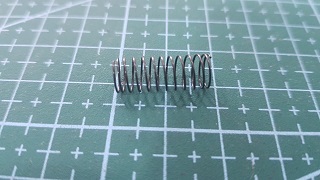 RESORTE DEL TENSOR LIBERADOR DE HILO DE RECTA